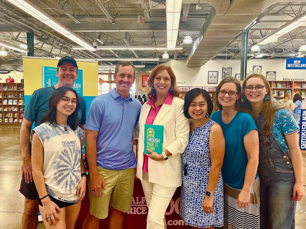 Michelle Prince with readers at a Half Price Books signing event for SHINE Through Your Story.