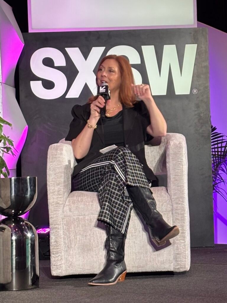 Michelle Prince moderating a panel on the SXSW Books stage.